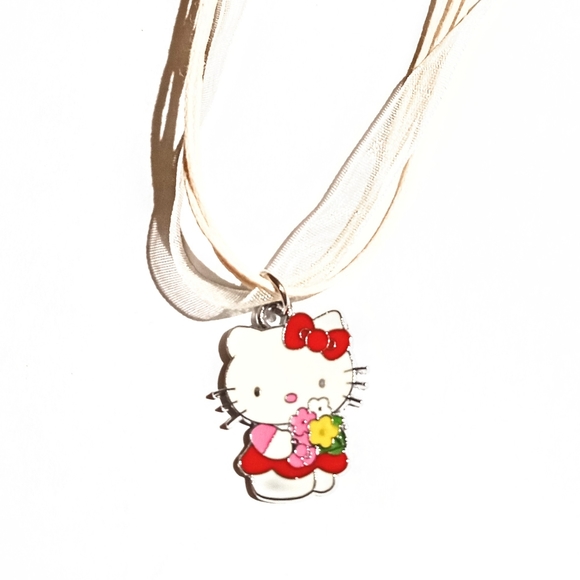 Hello Kitty Holding Flower Bouquet Wearing Red Dress Ribbon Necklace - Picture 5 of 7